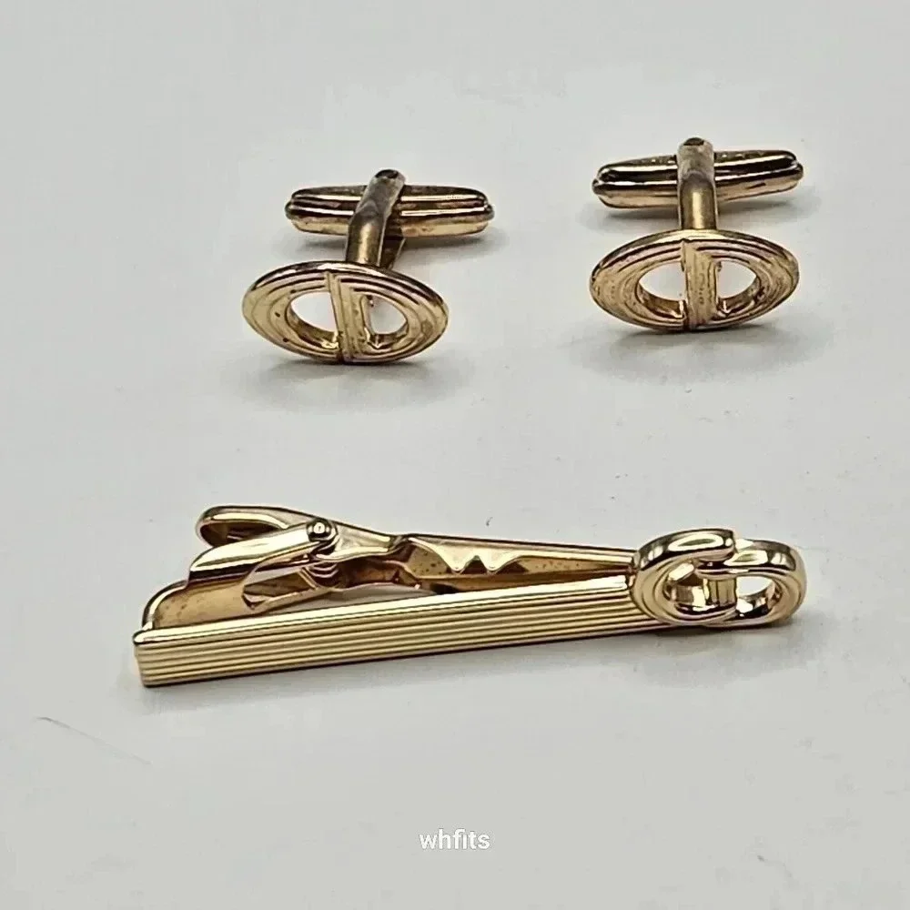 Christian Dior Gold Tone Cufflinks and Tie Bar Set